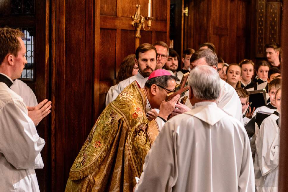 Trent Nelson  |  The Salt Lake Tribune
Bishop Oscar Solis venerates the crucifix with a kiss at the Cathedral of the Madeleine in Salt Lake City, Monday March 6, 2017.