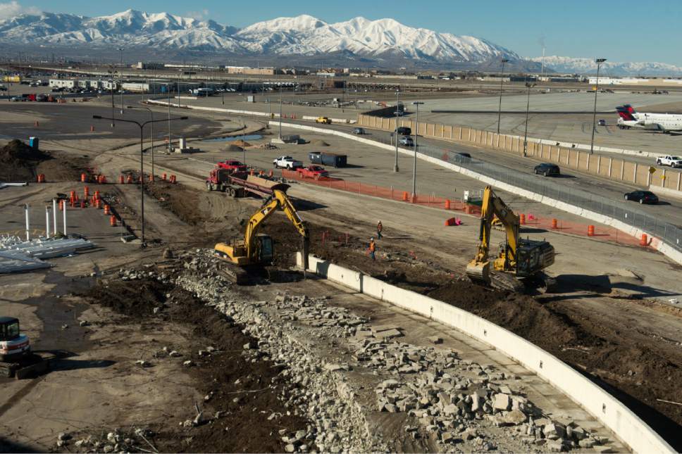 Rick Egan  |  Tribune file photo

Excavators demolish the exit ramp to what was previously the drive-through lane of the Salt Lake International Airport's short-term parking garage. The exit ramp area, as well as what formerly housed car rental canopies will become a new roadway exiting the airport the summer of 2016 to prepare for future construction projects at the airport, Monday, February 22, 2016.