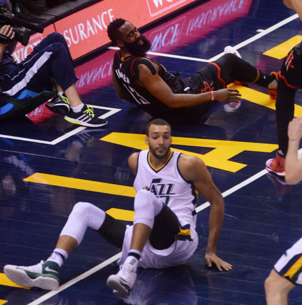 Steve Griffin / The Salt Lake Tribune


Houston Rockets guard James Harden (13), top, looks back at the ref after being knocked to the ground by Utah Jazz center Rudy Gobert (27) during the Utah Jazz versus Houston Rockets NBA game at Vivint Smarthome Arena in Salt Lake City Tuesday November 29, 2016.