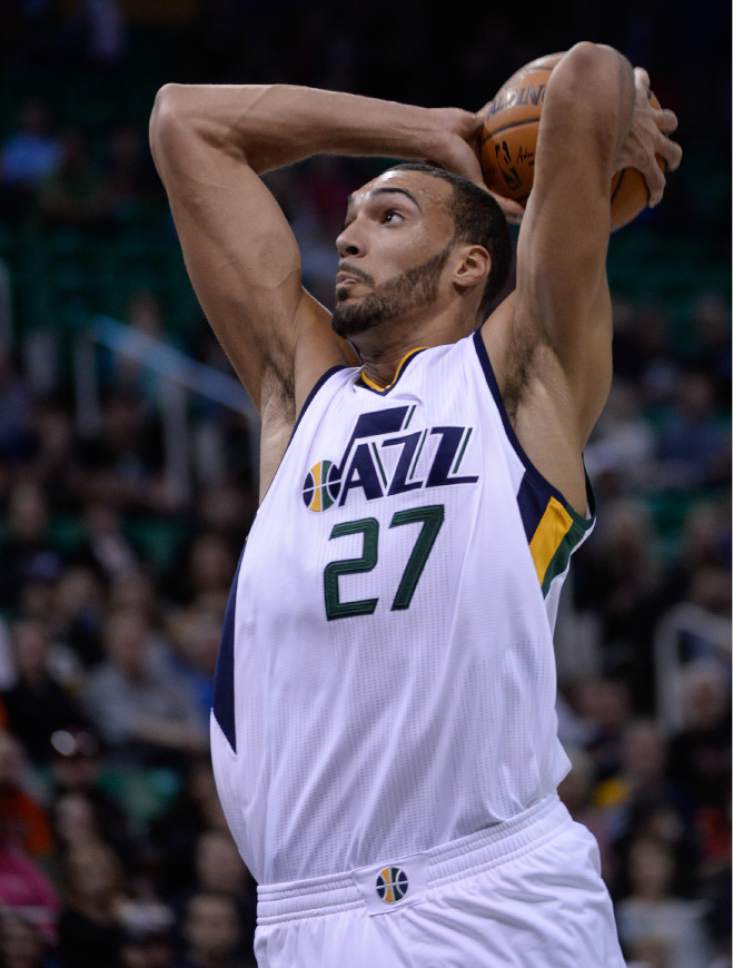 Francisco Kjolseth | The Salt Lake Tribune
Utah Jazz center Rudy Gobert (27) goes up for a monster dunk as the Jazz host the LA Clippers in game action at the Vivint Smart Home Arena on Monday, Oct. 17, 2016.