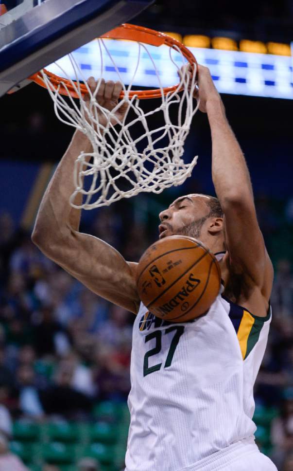 Francisco Kjolseth | The Salt Lake Tribune
Utah Jazz center Rudy Gobert (27) goes up for a monster dunk as the Jazz host the LA Clippers in game action at the Vivint Smart Home Arena on Monday, Oct. 17, 2016.