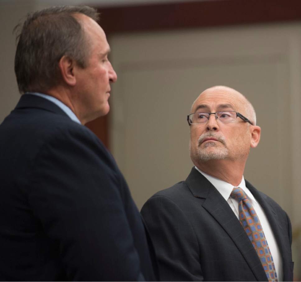 Steve Griffin  |  The Salt Lake Tribune

Attorney Rick Van Wagoner, right, looks at former Utah Attorney General Mark Shurtleff as they address 3rd District Court Judge Randall Skanchy at the Matheson Courthouse in Salt Lake City, Monday, June 15, 2015.