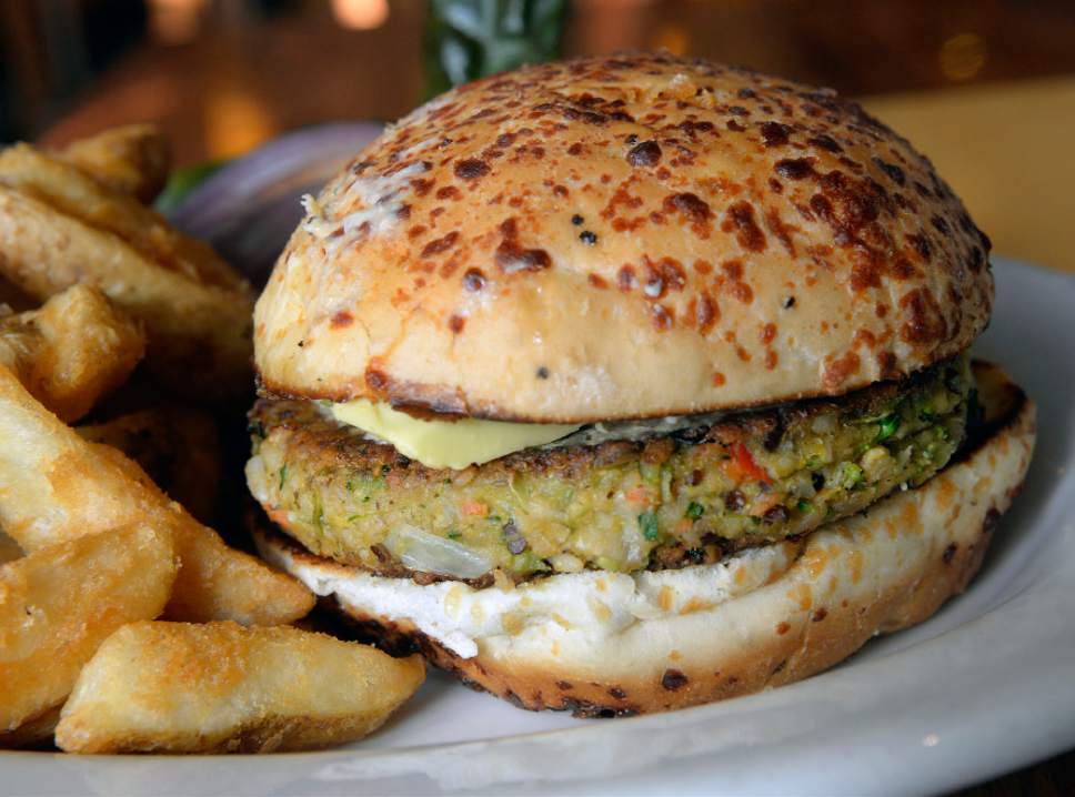 Al Hartmann  |  The Salt Lake Tribune
Squatters'  Chef's Veggie Burger, made with quinoa, garbanzo beans, roasted vegetables and topped with avocado and hummus.