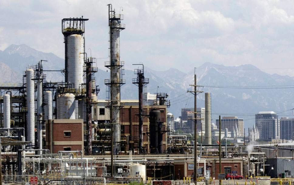 Downtown Salt Lake City can be seen in the background of this photo of the Tesoro refinery near 400 West and 900 North in Salt Lake City. Griffin/photo 07/15/04