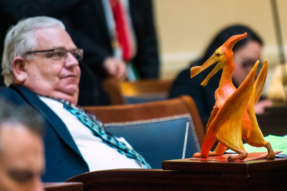 Chris Detrick  |  The Salt Lake Tribune
A toy pterodactyl on Senator Kevin T. Van Tassell's desk during Senate Floor Time at the Utah State Capitol Thursday March 9, 2017.