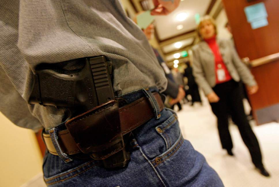 Francisco Kjosleth  |  Tribune File Photo

Charles Hardy of the Gun Owners of Utah, who has a concealed-weapons permit but choses to carry a gun openly, spends time at the Utah Capitol for the last day of the 2007 legislative session, contacting his representatives about gun rights. The Legislature passed SB251, which modifies provisions related to the posession and carrying of concealed firearms at institutions of higher education.