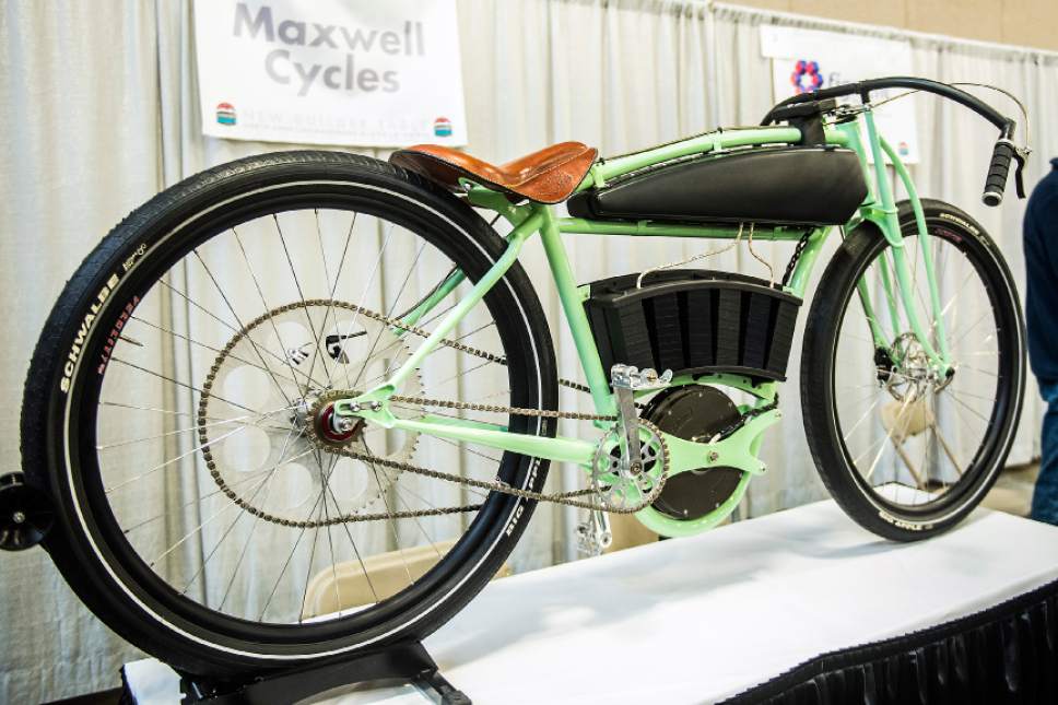 Chris Detrick  |  The Salt Lake Tribune
An electric bicycle from Maxwell Cycles at the North American Handmade Bicycle Show at the Salt Palace Convention Center on Saturday. North American Handmade Bicycle Show showcases the talents of individuals around the world whose art form is the bicycle. They are a meeting space for frame builders and consumers who are passionate about custom-made bikes.