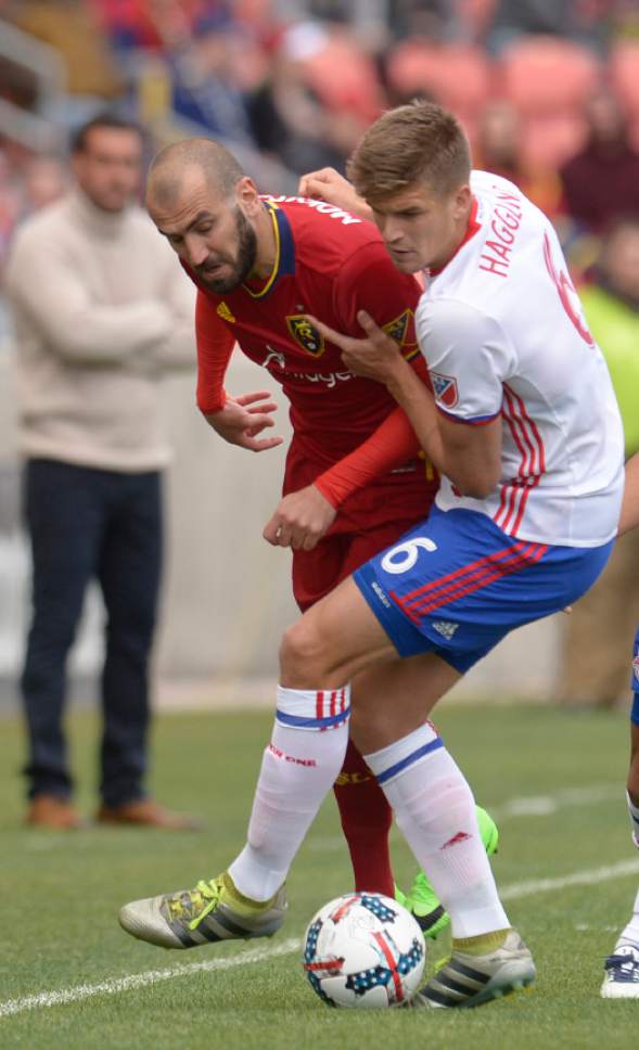 Leah Hogsten  |  The Salt Lake Tribune
Toronto FC defender Nick Hagglund (6) holds Real Salt Lake forward Yura Movsisyan (14) at the line. Real Salt Lake kicked off the 2017 season Saturday, March 4, 2017 with a home opener against Toronto FC at Rio Tinto Stadium. Real Salt Lake and Toronto FC are tied at the half.