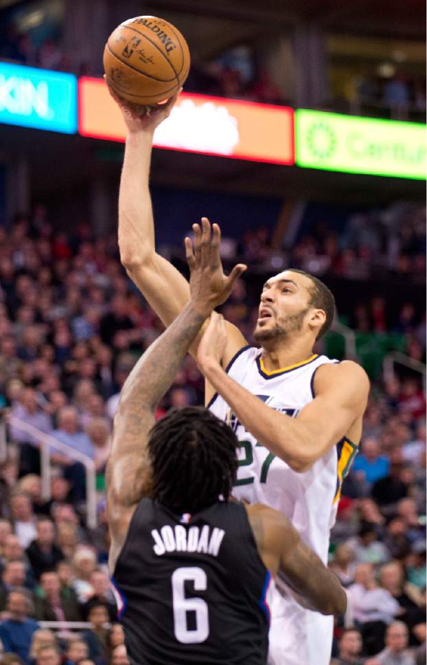 Lennie Mahler  |  The Salt Lake Tribune

Rudy Gobert shoots over DeAndre Jordan in the first half of a basketball game between the Utah Jazz and the LA Clippers at Vivint Smart Home Arena, Monday, Feb. 13, 2017.