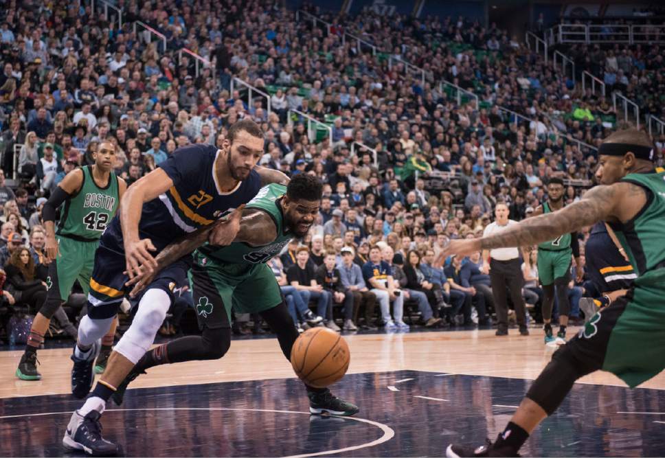 Lennie Mahler  |  The Salt Lake Tribune

Rudy Gobert, Amir Johnson and Isaiah Thomas rush toward a loose ball in the first half of a game between the Utah Jazz and the Boston Celtics on Saturday, Feb. 11, 2017.
