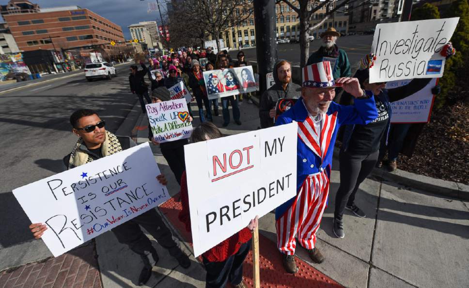 Francisco Kjolseth | The Salt Lake Tribune
Larry Swanson, center right, joins protesters as they take to the streets on President's Day in Salt Lake City, Monday, Feb. 20, 2017, to protest President Donald Trump.