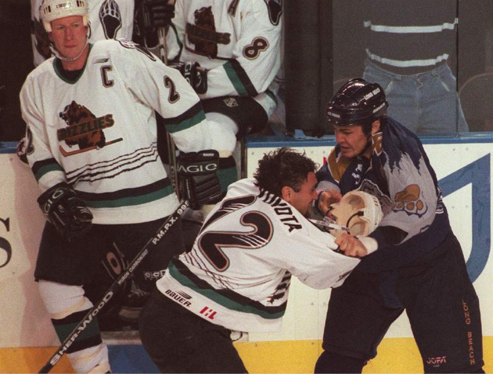 Leah Hogsten  |  The Salt Lake Tribune

The gloves and helmets came off during the first period and the fists began flying between Utah Grizzlies Mick Vukota and Long Beach Ice Dogs Jason Shmyr during Saturday Oct 10, 1998 game at the E Center.