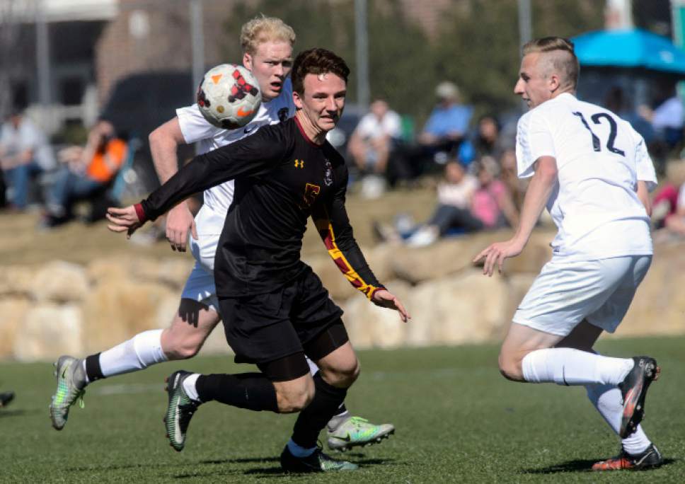 Steve Griffin  |  The Salt Lake Tribune


Lone Peak defender Brennan Ewell, right, spins for the ball during soccer match against Viewmont at Lone Peak High School in Highland, UT Tuesday March 14, 2017.