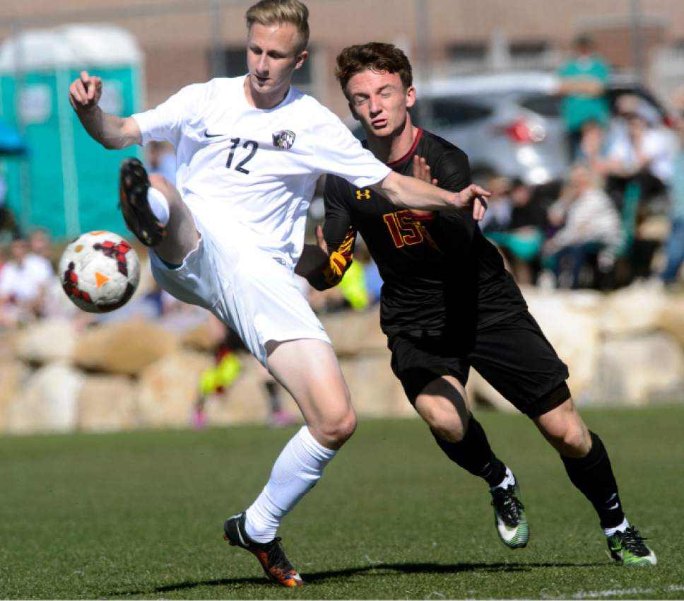 Steve Griffin  |  The Salt Lake Tribune


Lone Peak defender Brennan Ewell, leftt, clears the ball away during soccer match against Viewmont at Lone Peak High School in Highland, UT Tuesday March 14, 2017.