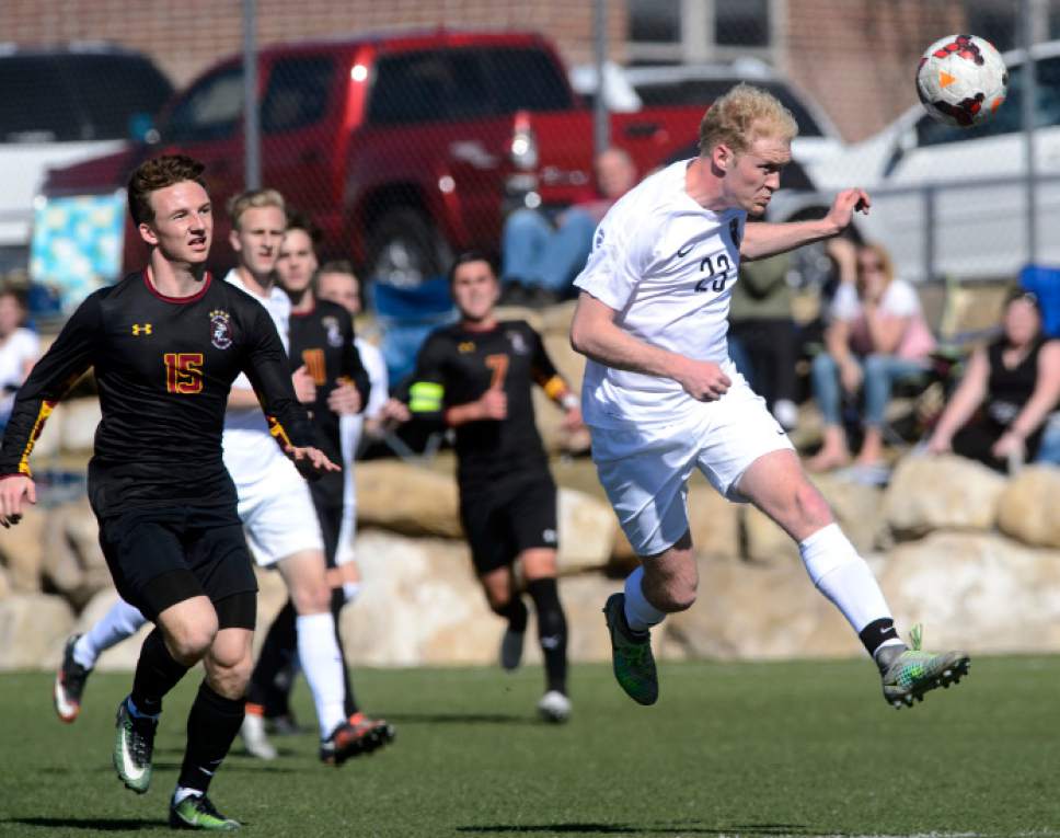 Steve Griffin  |  The Salt Lake Tribune


Lone Peak's Tanner Campbell heads the ball away from the Viewmont offense during soccer match at Lone Peak High School in Highland, UT Tuesday March 14, 2017.