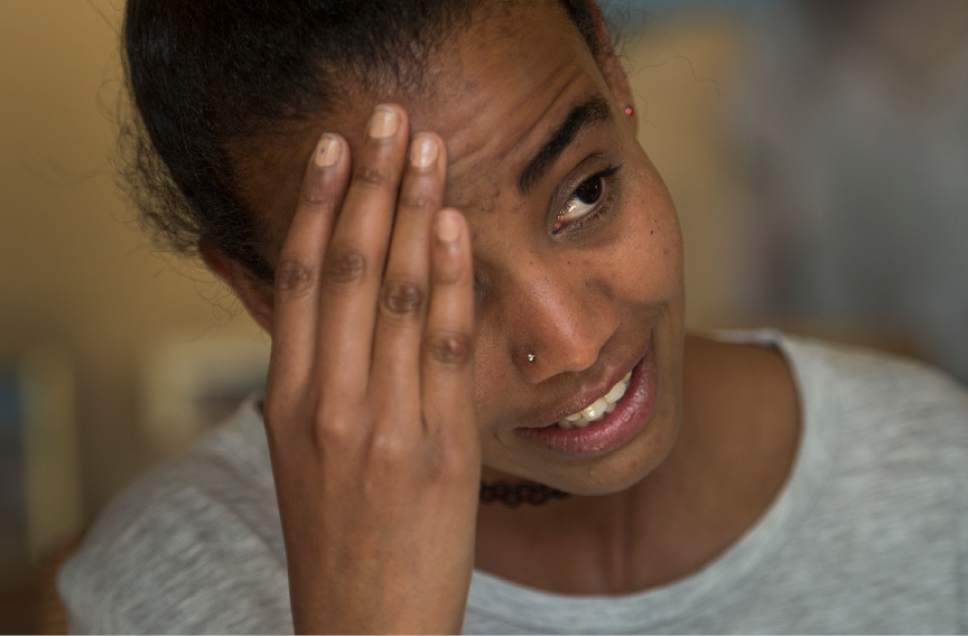 Leah Hogsten  |  The Salt Lake Tribune
"Half of me is with my family," said Rita Okbalidet, 20, a refugee from Eritrea, Africa who came to live in Utah in 2014. Okbalidet was sold by her guardian in Sudan, held for ransom in Sinai and dropped off blindfolded and alone in Cairo before receiving assistance from the United Nations High Commissioner for Refugees. Now she says she has many goals to accomplish. In a few months, Okbalidet will begin a nursing program at SLCC and hopes to bring her sister Miriam, 15, who is a refugee to Utah from Sudan.