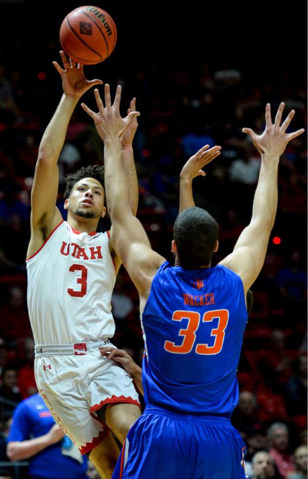 Steve Griffin  |  The Salt Lake Tribune


Utah Utes guard Devon Daniels (3) shoots over Boise State Broncos forward David Wacker (33) during the Utah versus Boise State basketball game in the first round of the NIT at the Huntsman Center on the University of Utah campus in Salt Lake City Tuesday March 14, 2017.