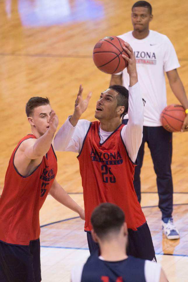 Chris Detrick |  The Salt Lake Tribune

Arizona Wildcats forward Keanu Pinder (25) runs drill with his team practice at the NCAA Tournament in Salt Lake City on Wednesday, March 15, 2017.