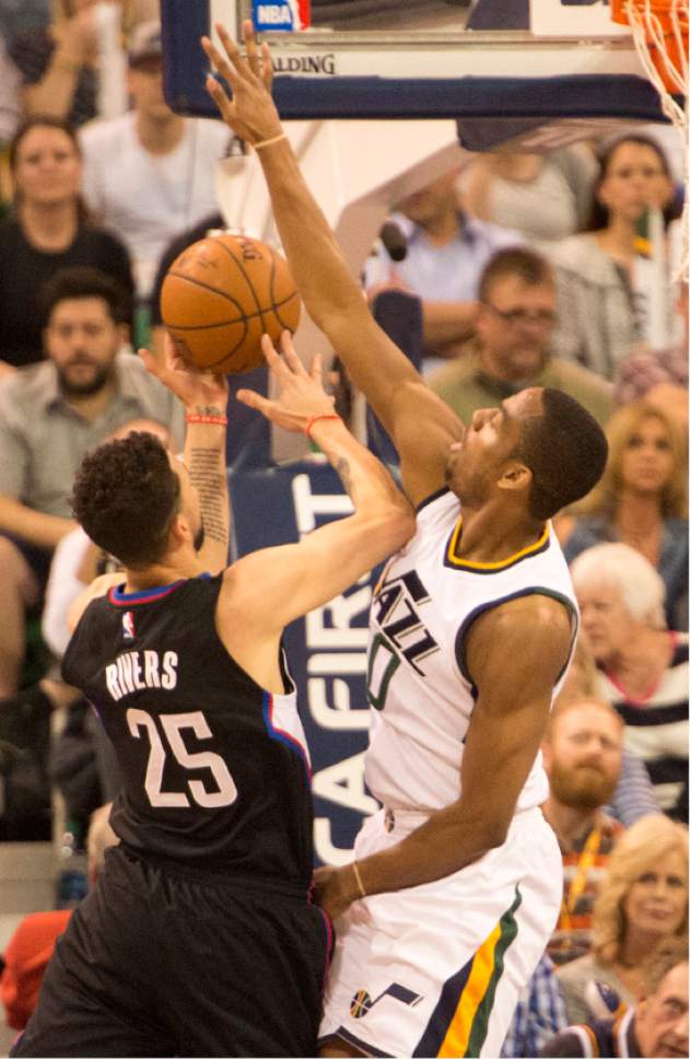 Rick Egan  |  The Salt Lake Tribune

Utah Jazz guard Alec Burks (10) blocks a shot by LA Clippers guard Austin Rivers (25), in NBA action Utah Jazz vs. LA Clippers, in Salt Lake City, Monday, March 13, 2017.