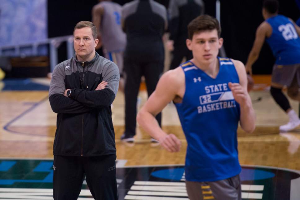 Trent Nelson  |  The Salt Lake Tribune

Coach T.J. Otzelberger watches South Dakota State Jackrabbits forward Adam Dykman (32) and the rest of the team during South Dakota State's practice at the NCAA Tournament in Salt Lake City on Wednesday, March 15, 2017.