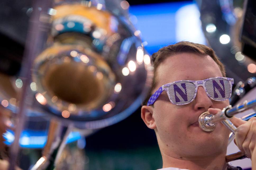 Trent Nelson |  The Salt Lake Tribune

A member of the Northwestern band performs during the team's practice at the NCAA Tournament in Salt Lake City on Wednesday, March 15, 2017.