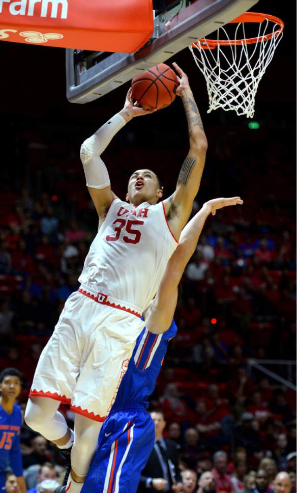 Utah forward Kyle Kuzma (35) goes up for a shot against Boise State in the first round of an NIT college basketball game in Salt Lake City on Tuesday, March 14, 2017. (Steve Griffin/The Salt Lake Tribune via AP)