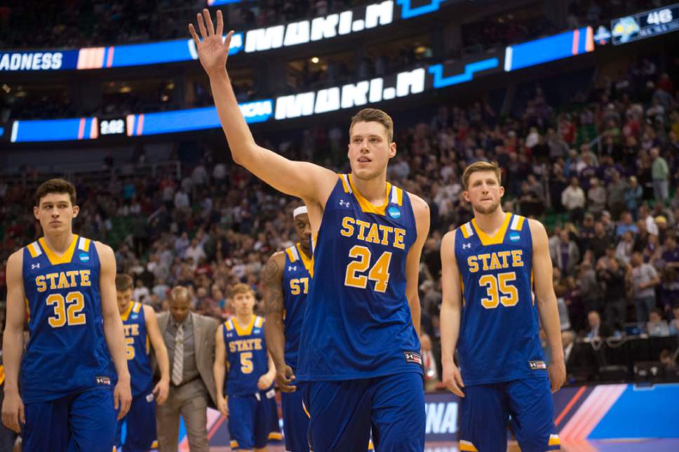 Chris Detrick  |  The Salt Lake Tribune

South Dakota State Jackrabbits forward Mike Daum (24) waves to the crowd after the team lost to Gonzaga during first round of the NCAA Tournament in Salt Lake City on Thursday, March 16, 2017.