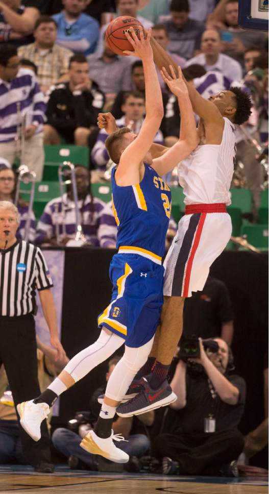 Trent Nelson  |  The Salt Lake Tribune

Gonzaga Bulldogs forward Johnathan Williams (3) blocks a shot by South Dakota State Jackrabbits forward Mike Daum (24) during first round of the NCAA Tournament in Salt Lake City on Thursday, March 16, 2017.
