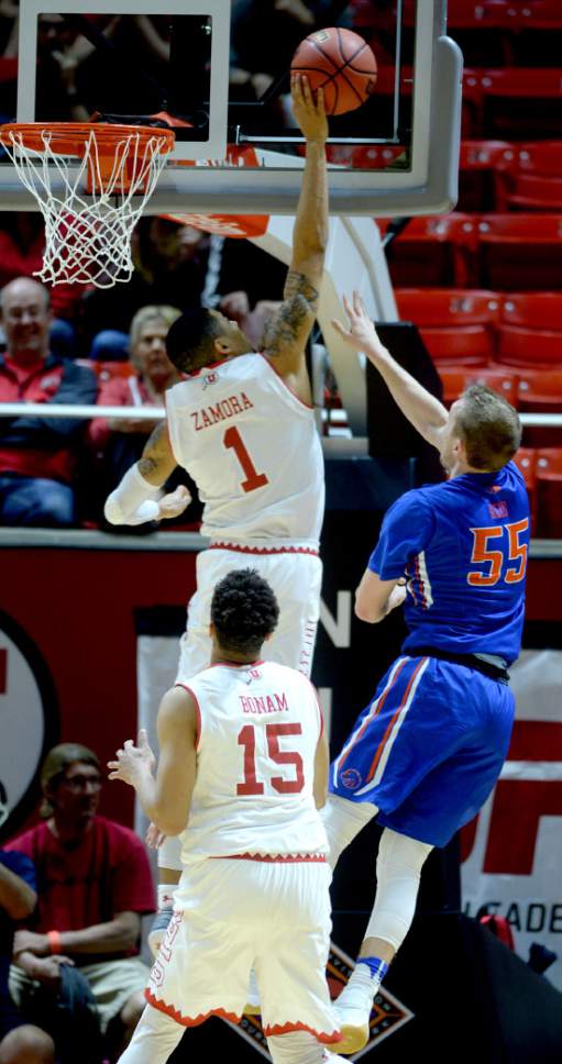 Steve Griffin  |  The Salt Lake Tribune


Utah Utes guard JoJo Zamora (1) blocks the shot of Boise State Broncos guard James Reid (55) during the Utah versus Boise State basketball game in the first round of the NIT at the Huntsman Center on the University of Utah campus in Salt Lake City Tuesday March 14, 2017.