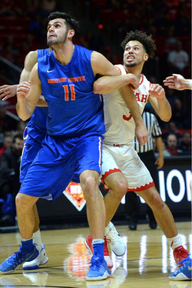 Steve Griffin  |  The Salt Lake Tribune


Utah Utes guard Devon Daniels (3) locks arms with Boise State Broncos forward Zach Haney (11) as the look to rebound the ball during the Utah versus Boise State basketball game in the first round of the NIT at the Huntsman Center on the University of Utah campus in Salt Lake City Tuesday March 14, 2017.