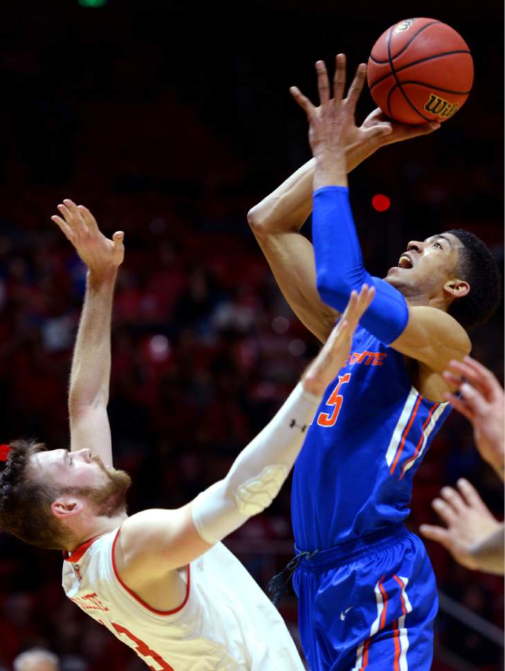Steve Griffin  |  The Salt Lake Tribune


Boise State Broncos guard Chandler Hutchison (15) scores over Utah Utes forward David Collette (13) during first round of the NIT at the Huntsman Center on the University of Utah campus in Salt Lake City Tuesday March 14, 2017.