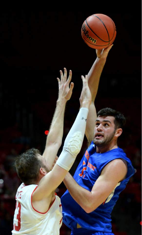Steve Griffin  |  The Salt Lake Tribune


Boise State Broncos forward Zach Haney (11) hooks a shot over Utah Utes forward David Collette (13) during the first round of the NIT at the Huntsman Center on the University of Utah campus in Salt Lake City Tuesday March 14, 2017.