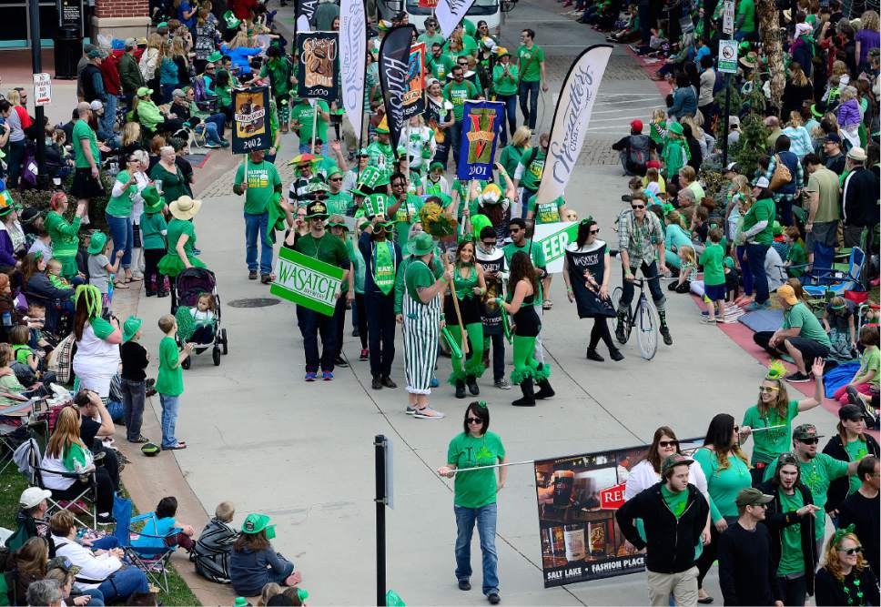 Scott Sommerdorf   |  The Salt Lake Tribune  
Parade watchers lined the edges of Rio Grande Street at The Gateway to watch the 40th annual St. Patrick's Day parade organized by the Hibernian Society of Utah in 2016.