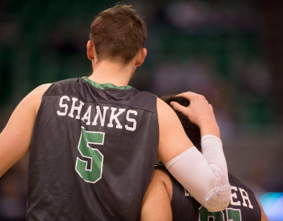 Trent Nelson  |  The Salt Lake Tribune

North Dakota Fighting Sioux center Carson Shanks (5) and North Dakota Fighting Sioux guard Quinton Hooker (21) leave the court after losing to Arizona during the first round of the NCAA Tournament in Salt Lake City on Thursday, March 16, 2017.