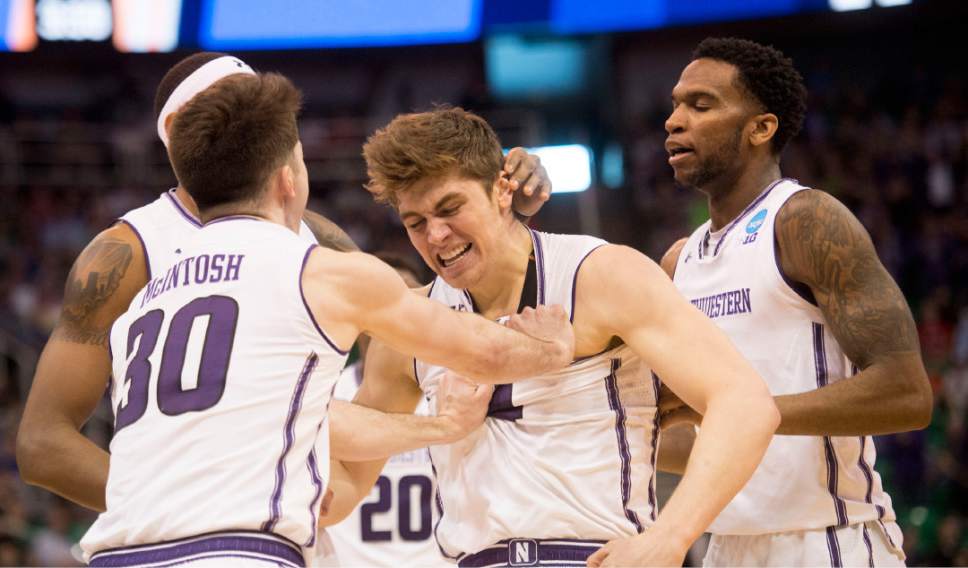 Chris Detrick  |  The Salt Lake Tribune

Northwestern Wildcats forward Gavin Skelly (44) celebrates with his teammates during the first round of the NCAA Tournament in Salt Lake City on Thursday, March 16, 2017.