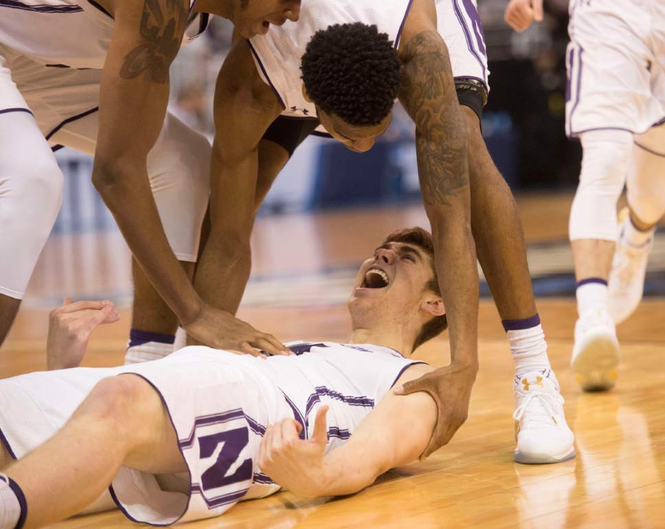 Chris Detrick  |  The Salt Lake Tribune

Northwestern Wildcats forward Gavin Skelly (44) celebrates with his team during the first round of the NCAA Tournament in Salt Lake City on Thursday, March 16, 2017.