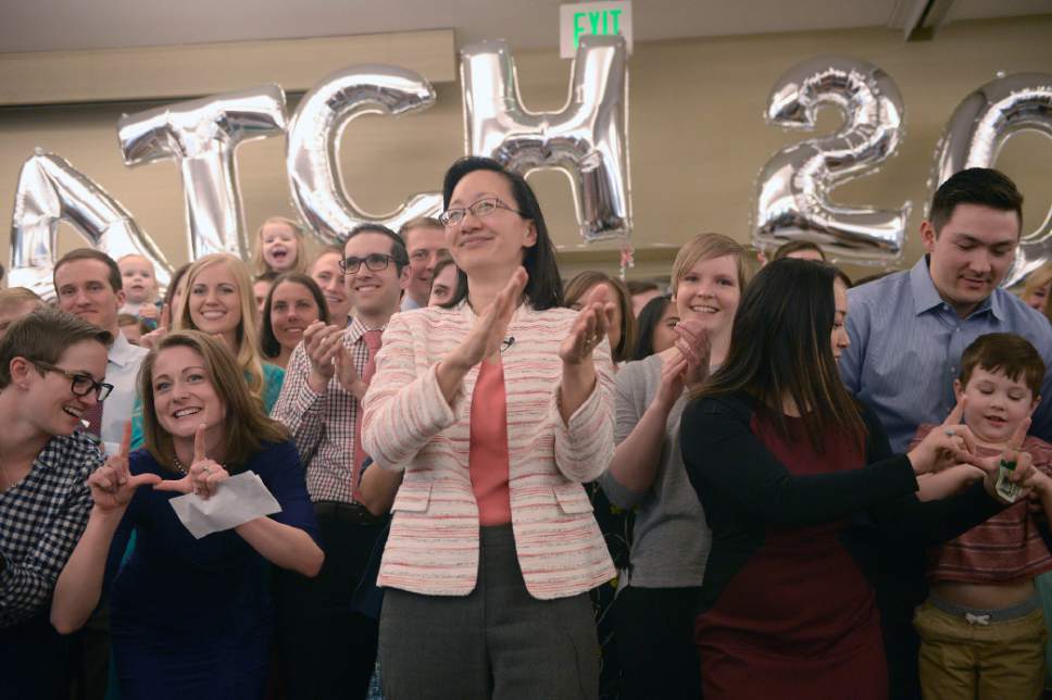 Al Hartmann  |  The Salt Lake Tribune
Vivian Lee, CEO of University of Utah Health Care and Dean of the University of Utah School of Medicine, center, gathers graduating students from the University of Utah School of Medicine on Friday for a group picture on match day.
