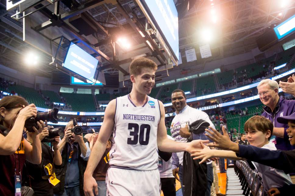 Chris Detrick  |  The Salt Lake Tribune

Northwestern Wildcats guard Bryant McIntosh (30) high fives dans after beating Vanderbilt during the first round of the NCAA Tournament in Salt Lake City on Thursday, March 16, 2017.