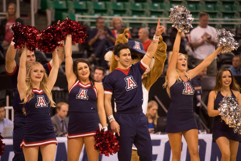 Chris Detrick  |  The Salt Lake Tribune

Arizona cheerleaders celebrate after their team beat St. Mary's in the NCAA tournament in Salt Lake City on Saturday, March 18, 2017.