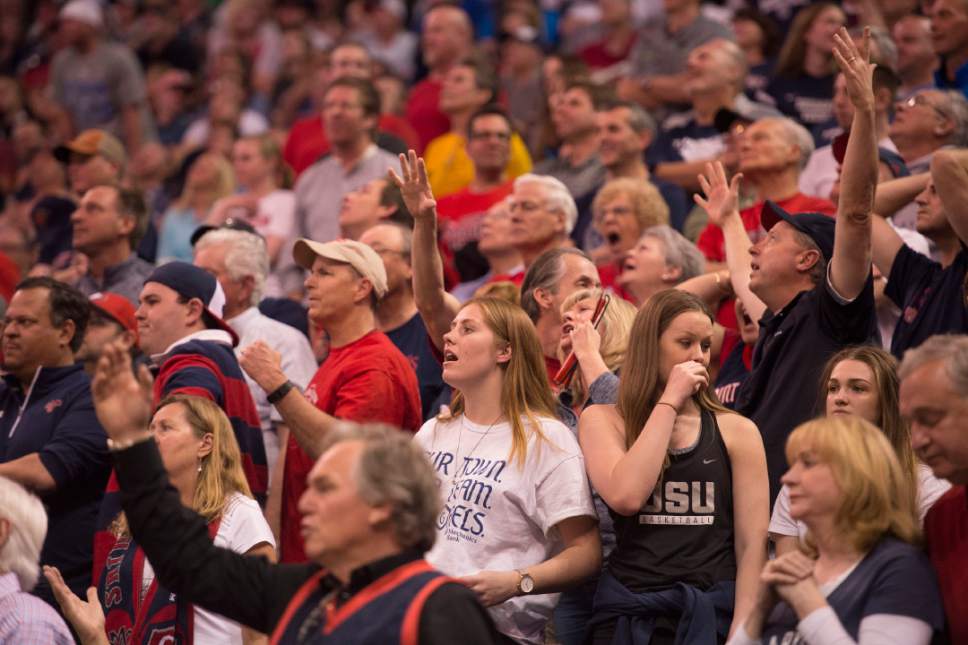 Trent Nelson  |  The Salt Lake Tribune

St. Mary's fans react to a play as they face Arizona in the NCAA tournament in Salt Lake City on Saturday, March 18, 2017.