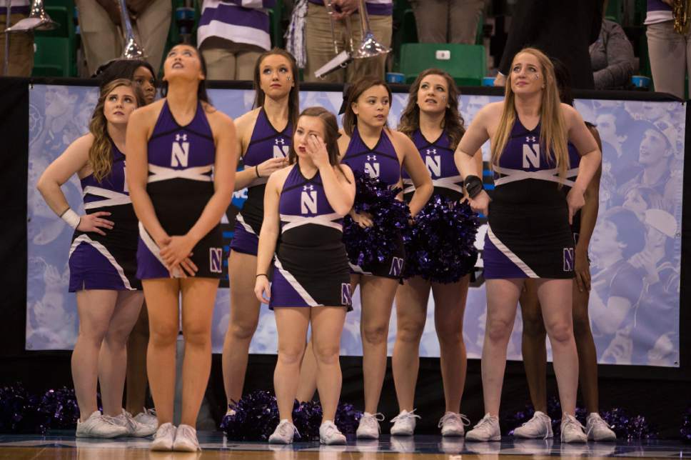 Trent Nelson  |  The Salt Lake Tribune

Northwestern cheerleaders watch as they lose to Gonzaga in the NCAA tournament in Salt Lake City on Saturday, March 18, 2017.