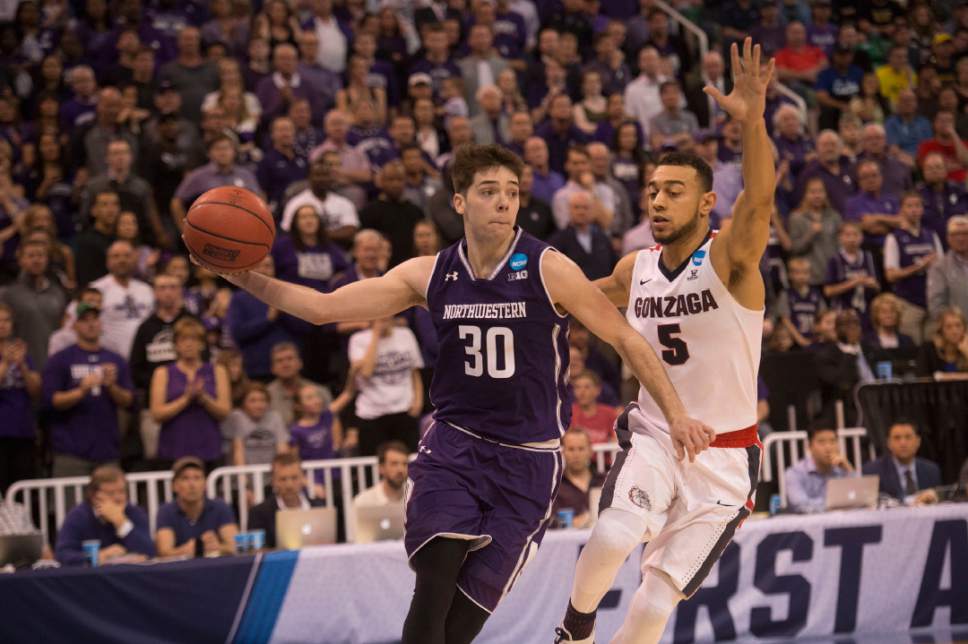 Chris Detrick  |  The Salt Lake Tribune

Northwestern Wildcats guard Bryant McIntosh (30) is defended by Gonzaga Bulldogs guard Nigel Williams-Goss (5) as the teams face off in the NCAA tournament in Salt Lake City on Saturday, March 18, 2017.