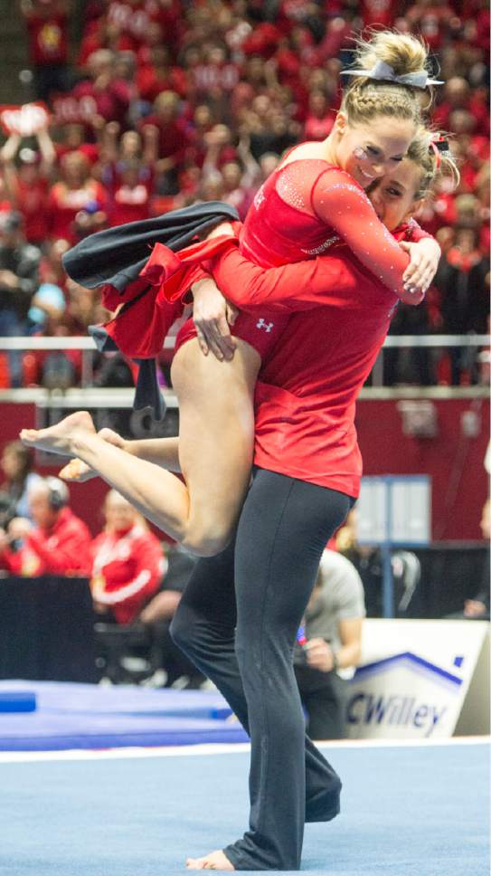Rick Egan  |  The Salt Lake Tribune

MyKayla Skinner gets a hug from a team mate, after her performance on the floor for the Utes, in gymnastics action, Utah vs UCLA, at the Huntsman Center, Saturday, February 18, 2017.