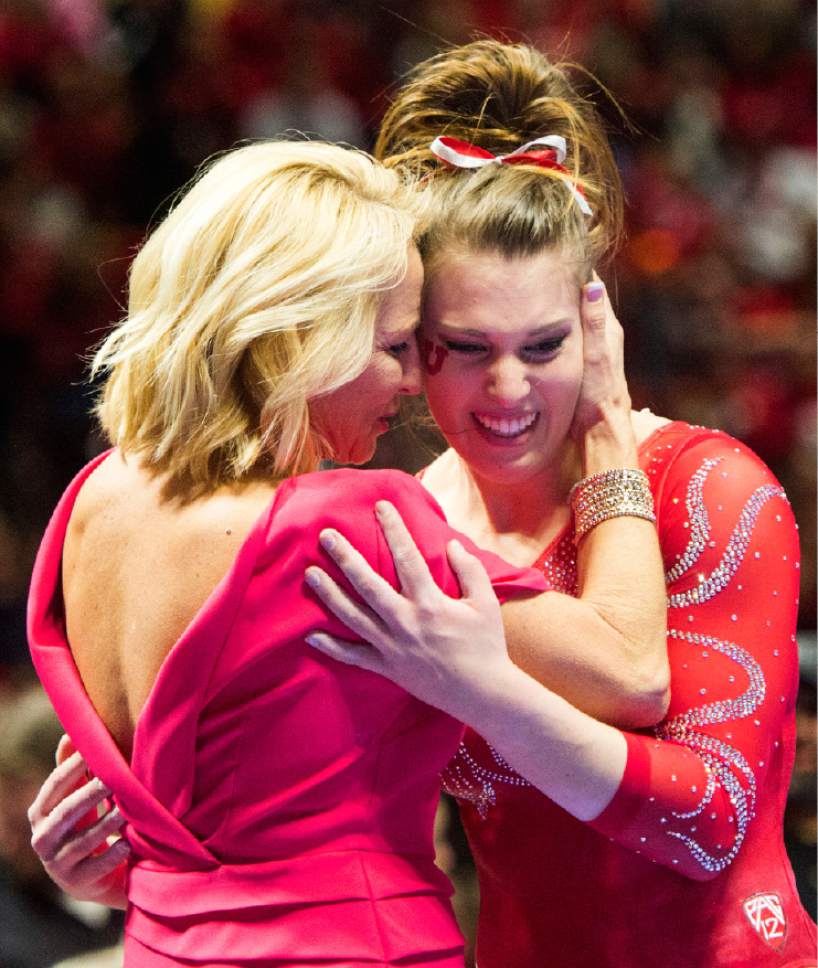 Rick Egan  |  The Salt Lake Tribune

Barely Rowe gets a hug from coach Megan Marsden after her performance on the bean for the Utes, in gymnastics action, Utah vs UCLA, at the Huntsman Center, Saturday, February 18, 2017.