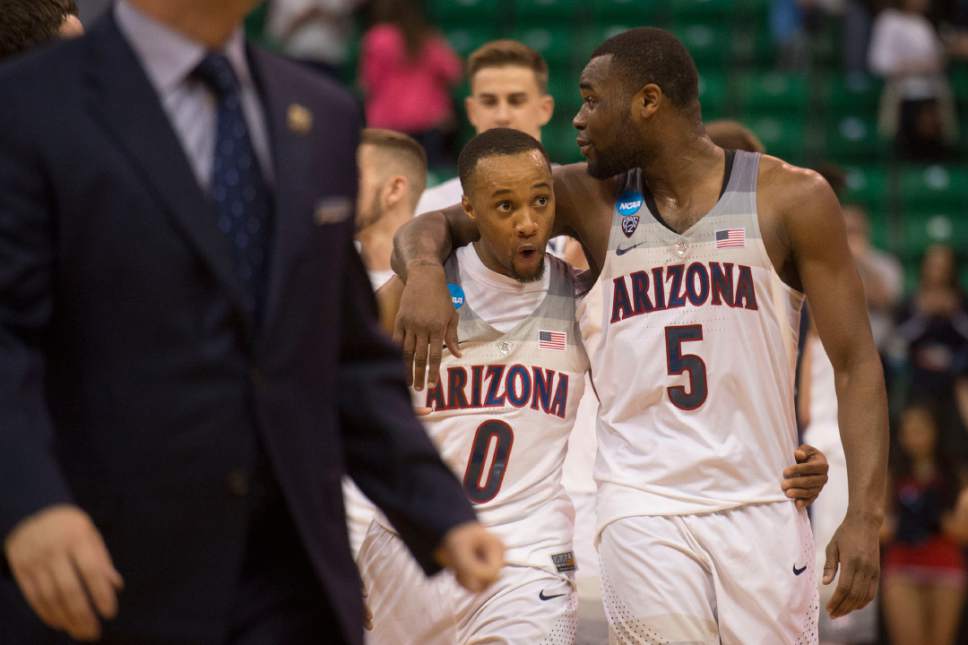 Chris Detrick  |  The Salt Lake Tribune

Arizona Wildcats guard Parker Jackson-Cartwright (0) and Arizona Wildcats guard Kadeem Allen (5) leave the court after beating St. Mary's in the NCAA tournament in Salt Lake City on Saturday, March 18, 2017.