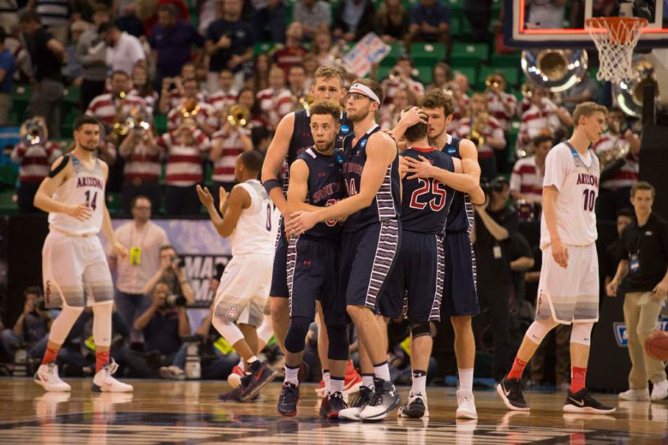 Trent Nelson  |  The Salt Lake Tribune

St. Mary's players console each other after losing to Arizona in the NCAA tournament in Salt Lake City on Saturday, March 18, 2017.