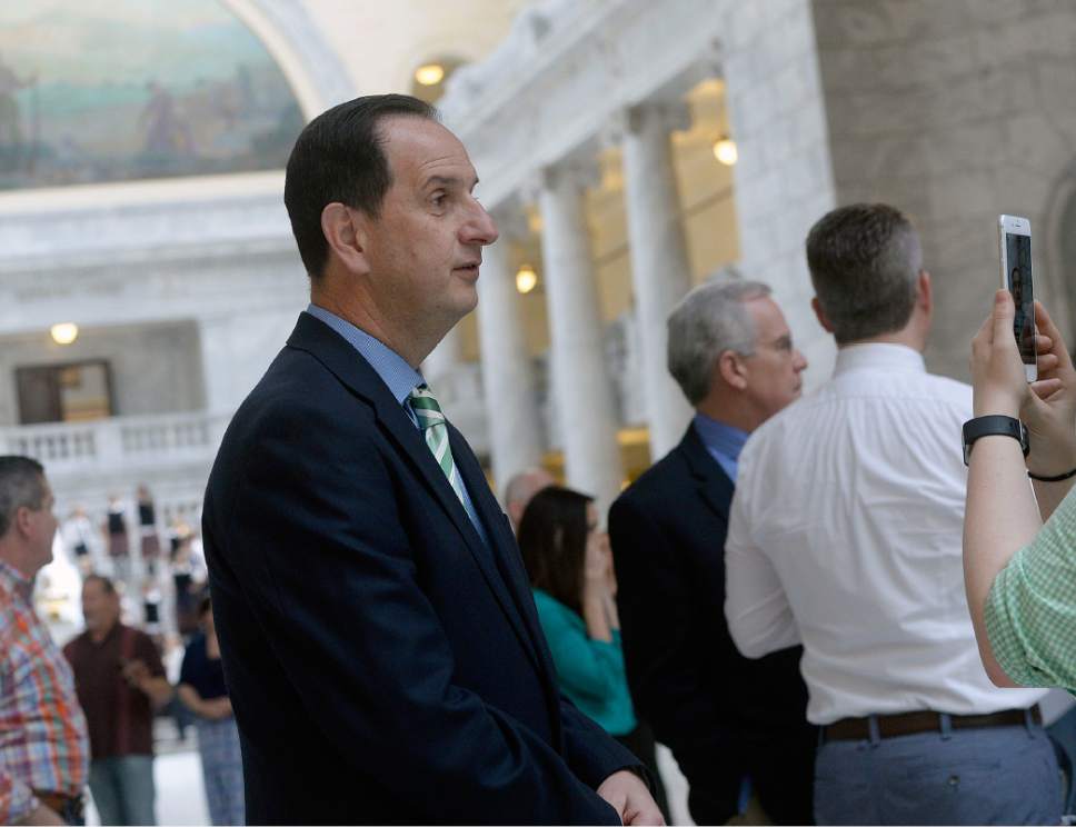 Al Hartmann  |  The Salt Lake Tribune
Rep. Norman Thurston, R-Provo, sponsor of HB 155 watches from the side at a rally in the state capitol rotunda asking Gov. Herbert to veto a just-passed bill that would lower the blood-alcohol content for drunkenness from 0.08 to 0.05.  Most there thought lowering of the levels would be bad for the hospitality industry and tarnish the state's reputation as a welcoming place for tourism and attracting out of state businesses.