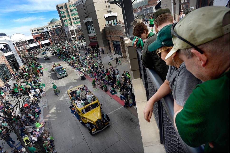 Scott Sommerdorf | The Salt Lake Tribune
Parade watchers take in the 39th annual St. Patrick's Parade from one of the pedestrian overpasses as the parade makes its way through the Gateway shopping center on Saturday.