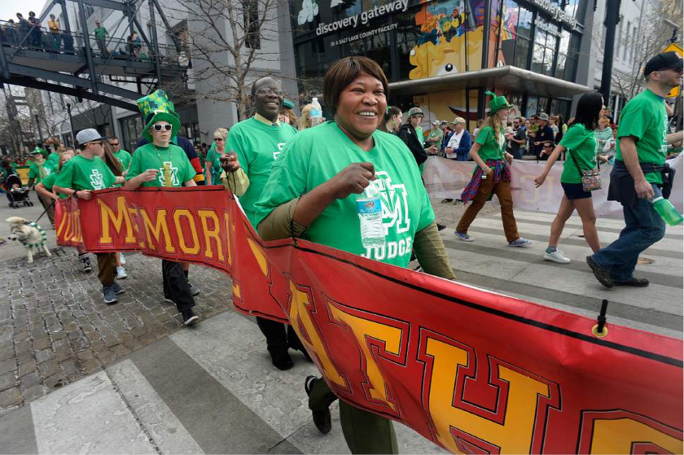 Scott Sommerdorf | The Salt Lake Tribune
The Judge Memorial contingent marches as the 39th annual St. Patrick's Parade makes it's way through the Gateway shopping center, Saturday, March 18, 2017.