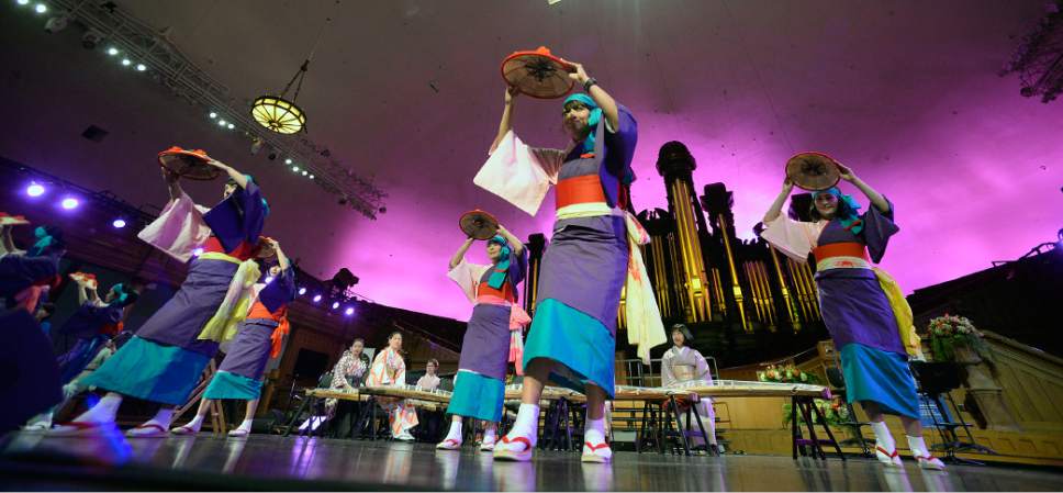 Al Hartmann  |  The Salt Lake Tribune
Obi Festival Dancers perform at a Sacred Music Evening in the Tabernacle Sunday March 19.  It  included musical performances, dances, scripture readings, and prayers from many Utah faith traditions.
Its part of the annual Interfaith Month that's been going on every year since the 2002 Olympic Winter Games in Salt Lake City.